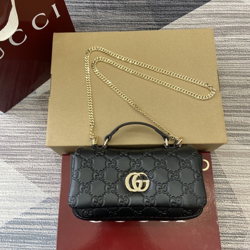 G*u*i top handle bags